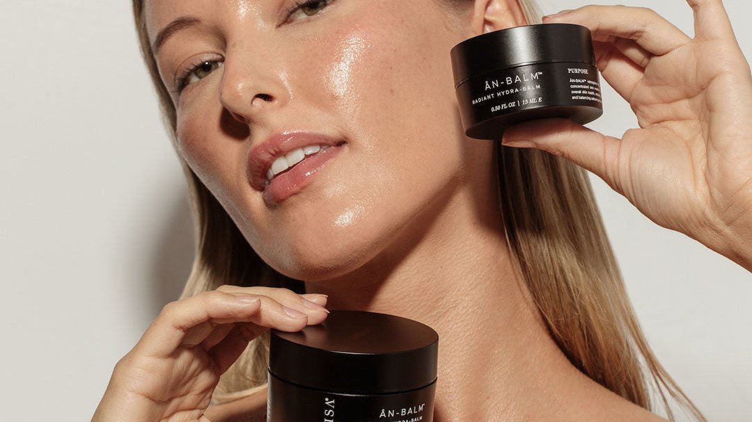 woman holding anifsa Ân-Balm Radian Hydra-Balm