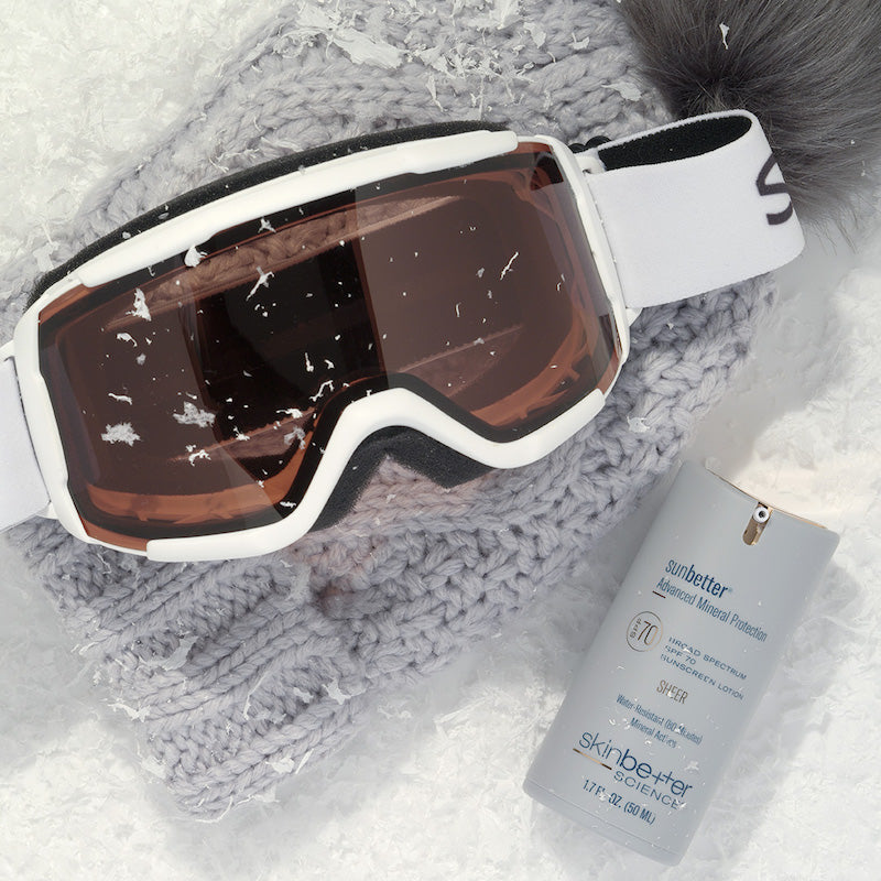sunbetter SHEER SPF 70 Sunscreen Lotion in show with snowboarding goggles